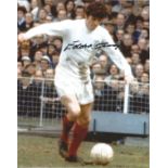 Eddie Gray signed 10x8 colour photo pictured in action for Leeds United. Good Condition. All