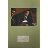 John Cleese signature piece mounted below colour photo. Approx overall size 12x10. Good Condition.