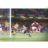 Robert Pires Arsenal Signed 12 X 8 inch football photo. Supplied from stock of www. sportsignings.