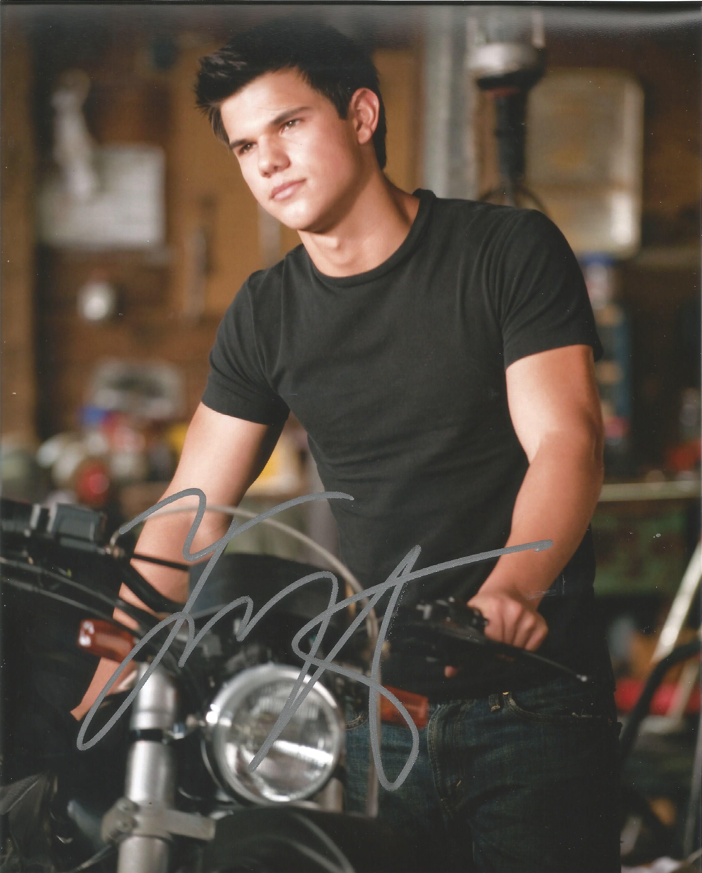 Taylor Lautner signed 10x8 colour photo. Good Condition. All autographs are genuine hand signed