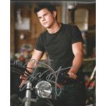 Taylor Lautner signed 10x8 colour photo. Good Condition. All autographs are genuine hand signed