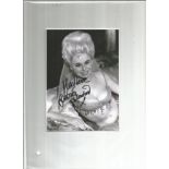 Barbara Windsor Actress Signed Carry On 5x7 Photo . Good Condition. All autographs are genuine