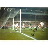 Liverpool Ian St john Signed 12 x 8 inch football photo. Supplied from stock of www.sportsignings.