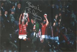 Bryan Robson Man United Signed 12 x 8 inch football colour photo. Supplied from stock of www.