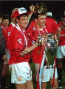 Bryan Robson and Steve Bruce Man United Signed 16 x 12 inch football photo. Supplied from stock of