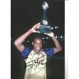 Michael Thomas Arsenal Signed 12 x 8 inch football photo. Supplied from stock of www.sportsignings.