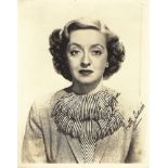 Bette Davis Signed photo black and white 10 x 8 inch. Dedicated Semi-legible personalisation.