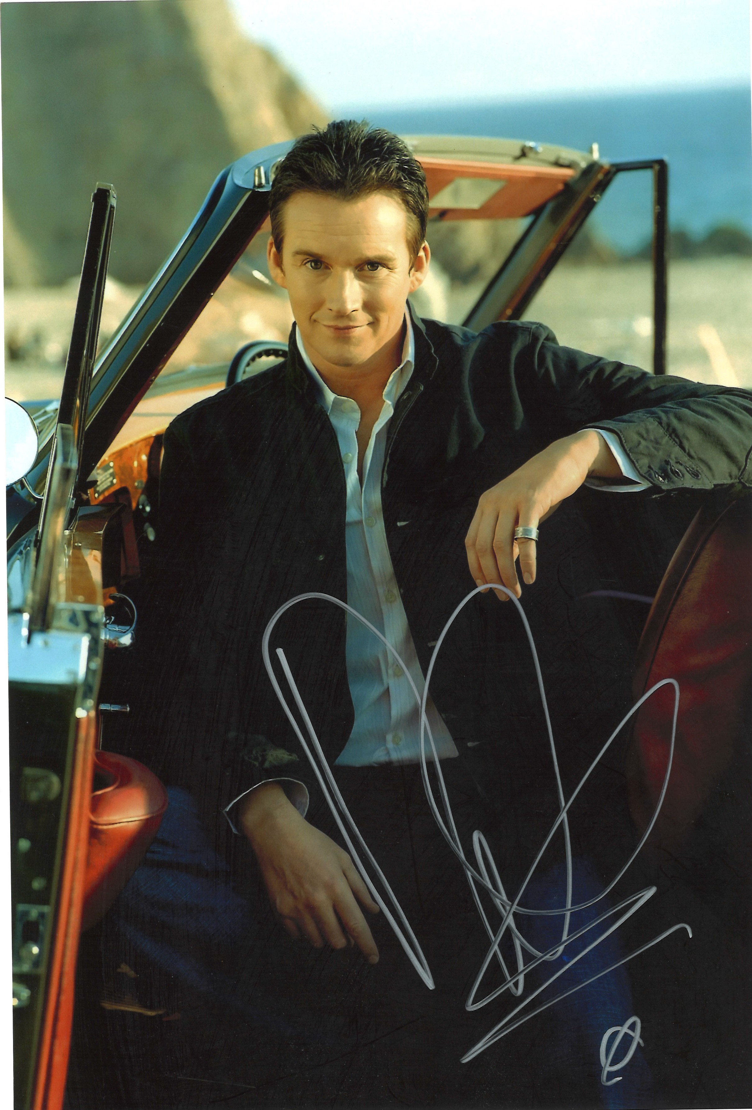 Russell Watson Signed 12 x 8 inch music photo. Good Condition. All autographs are genuine hand