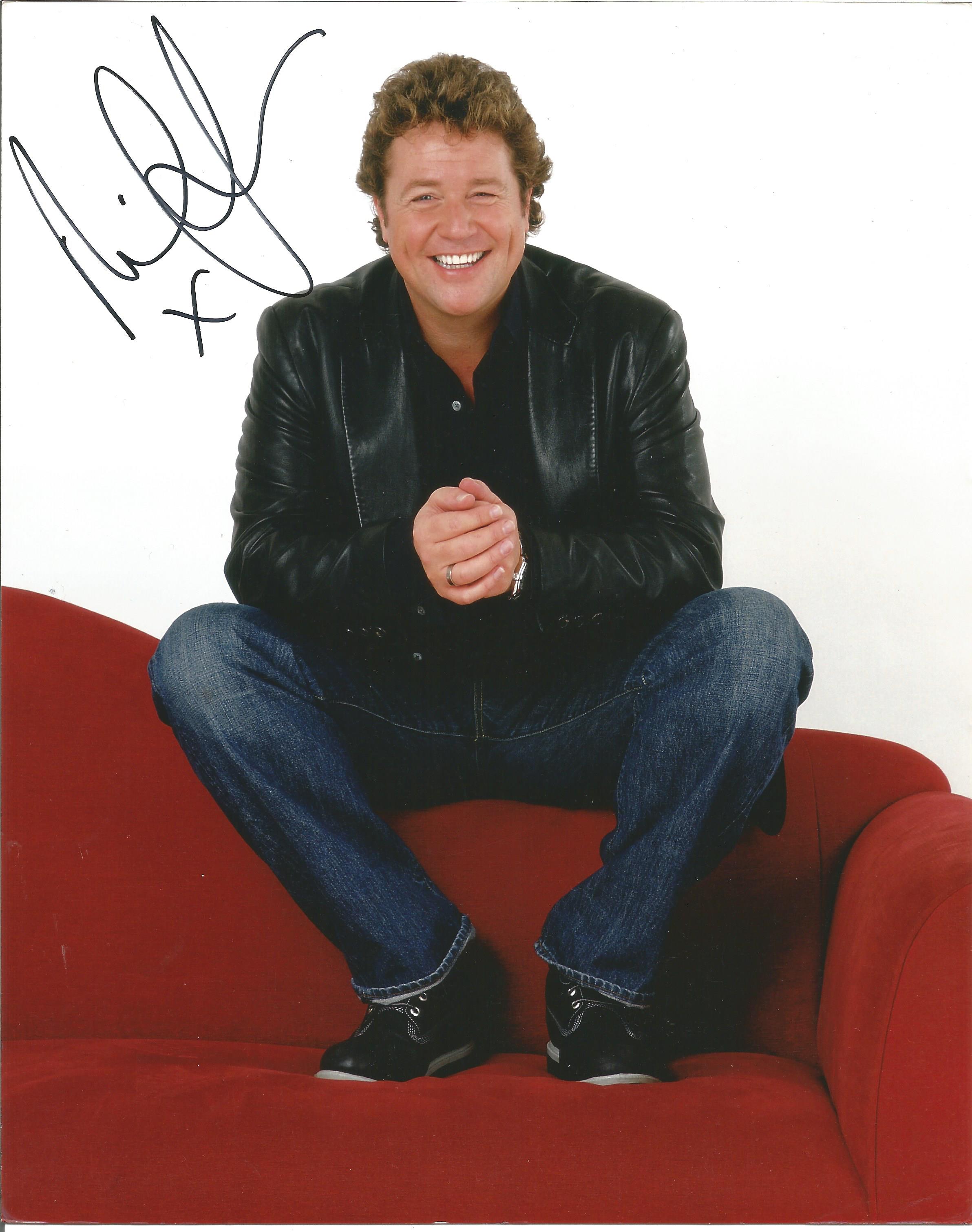 Michael Ball signed great 10x8 colour photo sitting on couch. Good Condition. All autographed