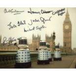 DOCTOR WHO 8x10 Daleks in London photo signed by SEVEN actors who have appeared in Doctor Who, these