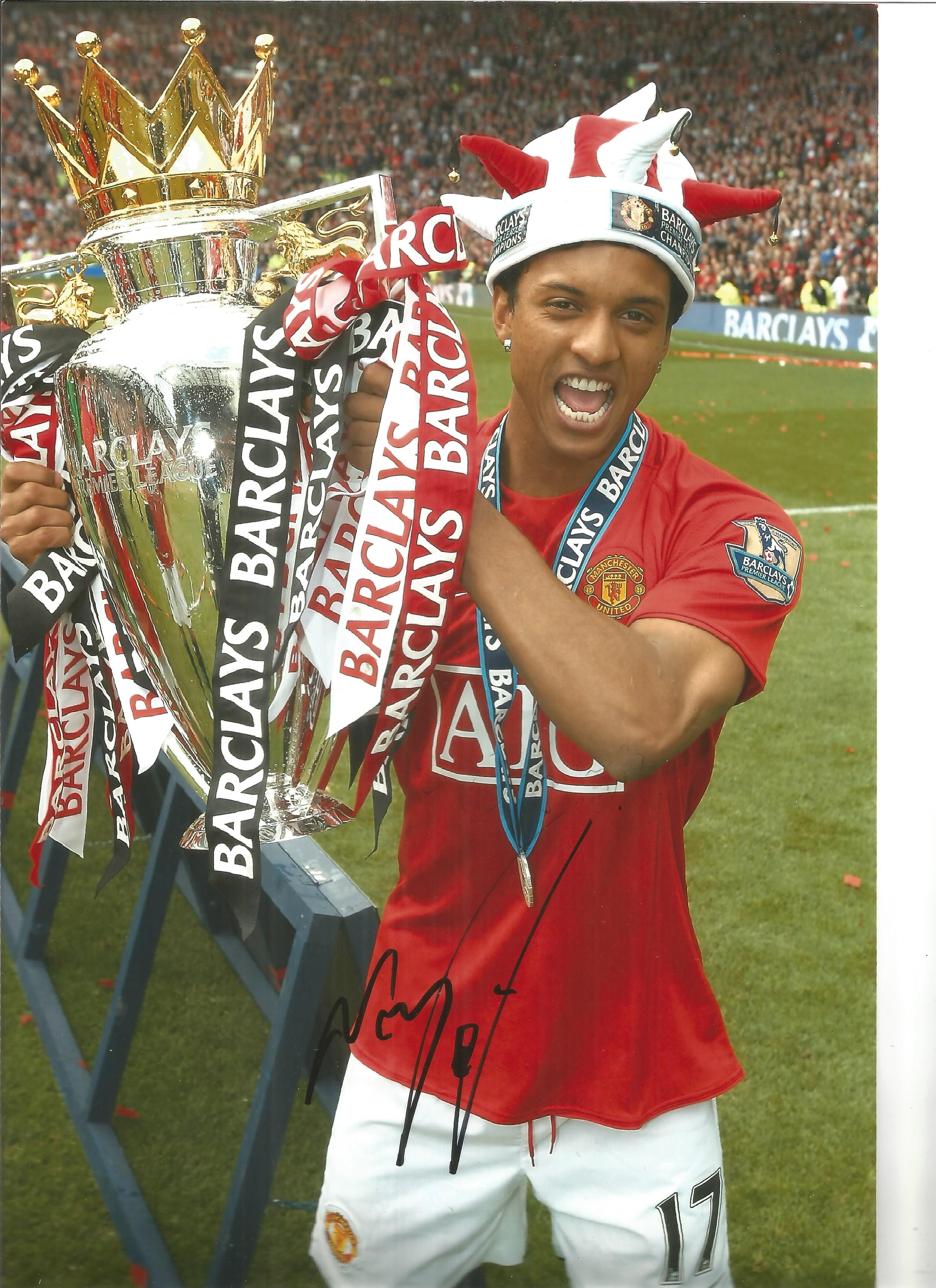 Football Nani 10x8 signed colour photo pictured with the Premier league trophy while playing for