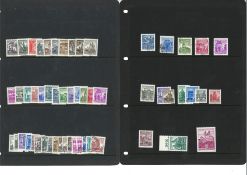 Austrian stamp collection on loose stock pages. 80+ stamps. Mint and used. Catalogues at nearly £