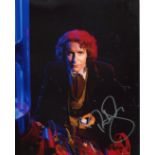DOCTOR WHO 8x10 scene photo signed by actor Paul McGann as the Time Lord himself. Good Condition.