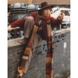 DOCTOR WHO 8x10 scene photo signed by actor Tom Baker as the Time Lord himself. Good Condition.