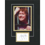 Gregor Fisher signature piece mounted below colour photo. Approx. overall size 16x12. Good