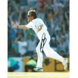 Cricket Graeme Swann Signed 12 x 8 inch cricket colour photo. Good Condition. All signed pieces come