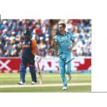 Cricket Chris Woakes signed 12x8 colour photo pictured in action during Englands successful campaign