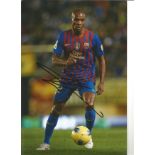 Football Eric Abidal signed 12x8 colour photo pictured in action for Barcelona. Eric Sylvain