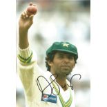 Cricket Mohammad Asif Signed 10 x 8 inch cricket colour photo. Good Condition. All signed pieces
