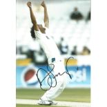 Cricket Mohammad Asif Signed 12 x 8 inch cricket colour photo. Good Condition. All signed pieces