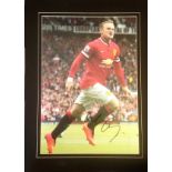 Football Wayne Rooney signed 20x14 mounted colour photo pictured in action for Manchester United.