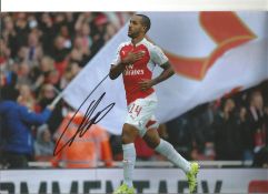 Football Theo Walcott signed 12x8 colour photo pictured while playing for Arsenal. Theo James