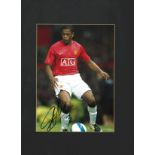 Football Patrice Evra signed 16x12 mounted colour photo pictured in action for Manchester United.