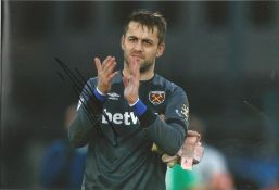 Lukasz Fabianski Signed West Ham 8x10 Photo. Good Condition. All signed pieces come with a
