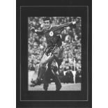 Football Tony Hateley signed 16x12 mounted black and white photo pictured in action for Liverpool.