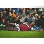 Football Michail Antonio signed 12x8 colour photo pictured celebrating for West Ham United.