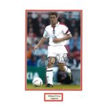 Football Michael Owen signed 16x12 mounted colour photo pictured in action for England. Good