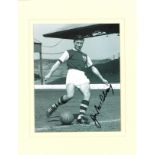 Football Jimmy Mcilroy signed 14x12 mounted black and white photo pictured while playing for