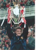 Football Steve Bruce signed 12x8 colour photo pictured lifting the Premier league trophy while