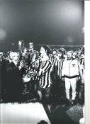 Football Johan Cruyff signed 12x8 black and white photo pictured receiving the European Cup during