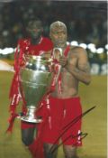 Djibril Cisse Signed Liverpool 8x12 Photo. Good Condition. All signed pieces come with a Certificate