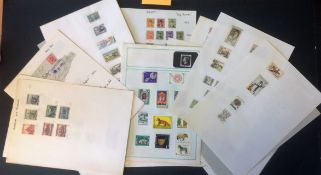 World stamp collection on 36 loose album pages. Includes Egypt, Czechoslovakia, Bulgaria. Good