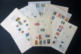 British commonwealth stamp collection on approx. 30 loose album pages. Includes Singapore, South