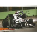 Formula 1 Nick Heidfeld Grand Prix racing driver signed Sauber car in action photo. Comes with COA