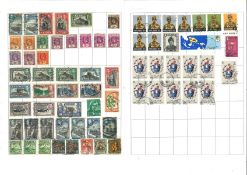 British commonwealth stamps over 24 album leaves. Includes Ceylon, Hong Kong, India, Malaya,
