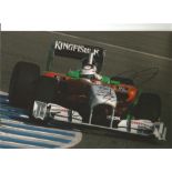 Formula 1 Adrian Sutil Grand Prix racing driver signed Force India car in action photo. Comes with