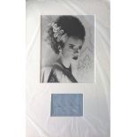 Elsa Lancaster signature piece mounted below black and white photo. Approx overall size 16x12.