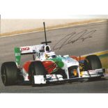 Formula 1 Paul Di Resta Grand Prix racing driver signed Force India car in action photo. Comes