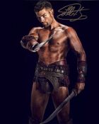 Blowout Sale! Spartacus Liam McIntyre hand signed 10x8 photo. This beautiful hand signed photo