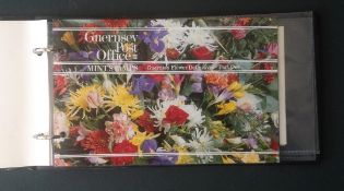 Guernsey flower collection album. Includes 2 presentation pack, 1993 flower definitives I and II.