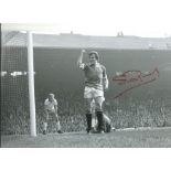 Stuart Pearson 1974 Football Autographed 12 X 8 Photo, A Superb Image Depicting Pearson Punching The