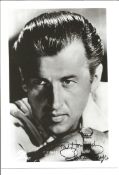 Stewart Granger signed 7 x 5 inch b/w photo for Howard. Good Condition. All signed pieces come