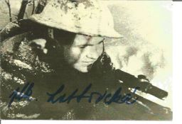 Top WW2 sniper Lyudmila Paulichenko signed 6 x 4 b/w photo with her gun taking aim. Lyudmila