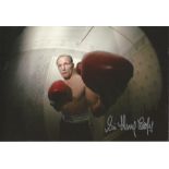 Sir Henry Cooper Signed 12 x 8 inch boxing photo. Good Condition. All signed pieces come with a