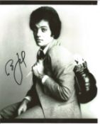 Music Billy Joel signed 12 x 8 inch bw photo nice early image with boxing gloves over shoulder. Good