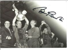 Bobby Charlton signed 6 x 4 inch b/w photo holding the European cup. Good Condition. All signed